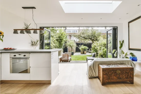 Modern home extension interior with floor-to-ceiling glazing and minimal décor
